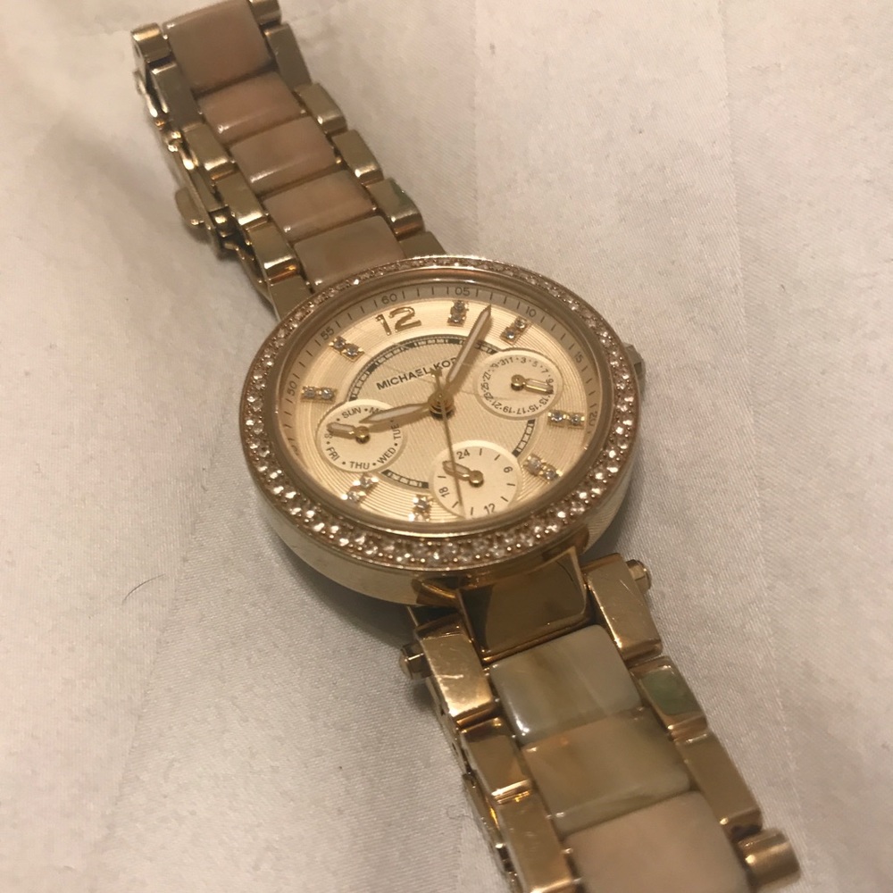 Michael Kors gold watch with horn details